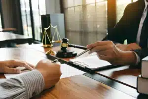 Bankruptcy attorney discussing wage garnishment and debt relief options with a client